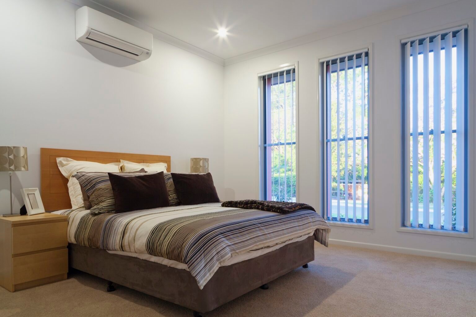 Split system air conditioning Perth bedroom with wall-mounted unit